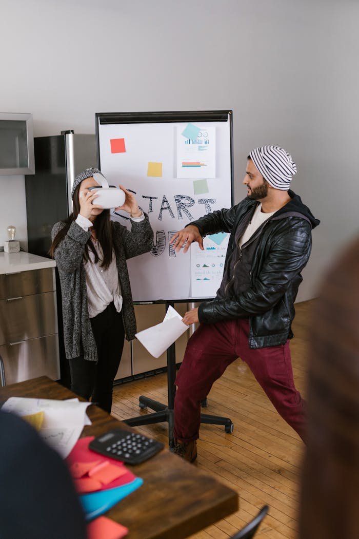 Dynamic scene of young entrepreneurs using VR technology in a startup setting.
